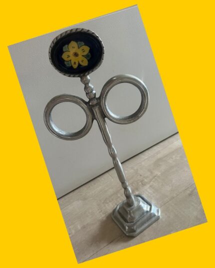 Toallero decorativo de peltre