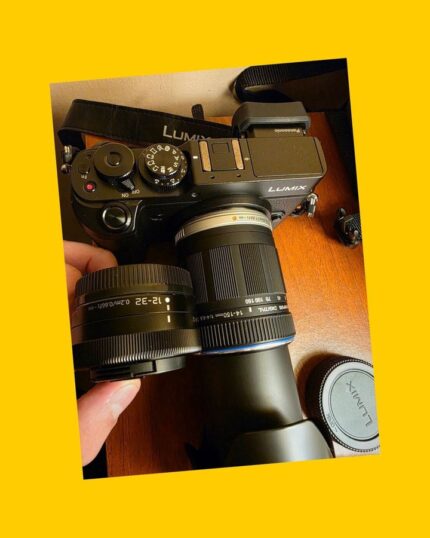 Camara con lente kit, lente 14-150mm, tarjeta SD, bolso, parasol y adaptador Panasonic